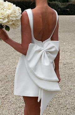 Charlotte - Elegant Pearl Bow Mini Dress